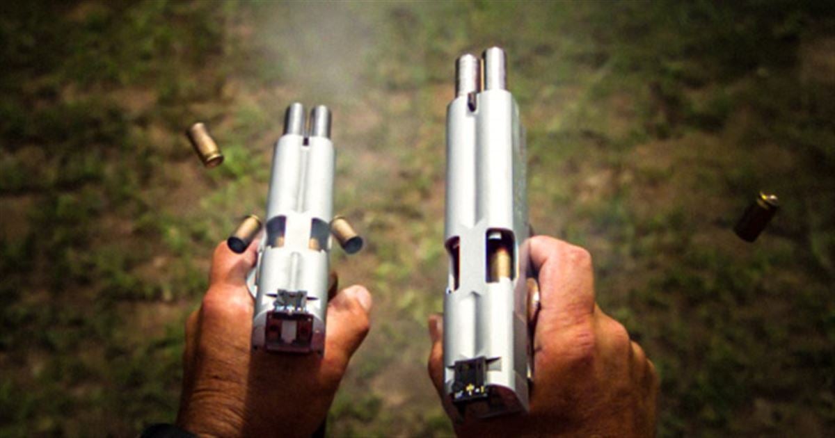 Watch DoubleBarreled 1911 Pistol Rapid Fire