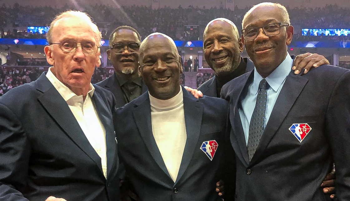 CLEVELAND, OHIO – FEBRUARY 20: Dominique Wilkins, Michael Jordan, James  Worthy, and Bob McAdoo pose for pictures after the introduction of the NBA  75th Anniversary Team during the 2022 NBA All-Star Game