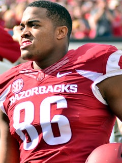 Where did Trey Flowers play football in college? (Factoid 1,010)