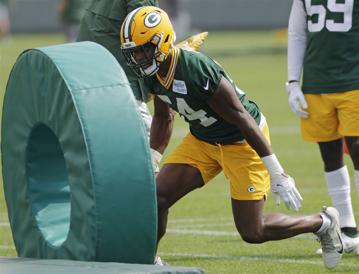 Green Bay Packers' Krys Barnes runs a drill at the NFL football