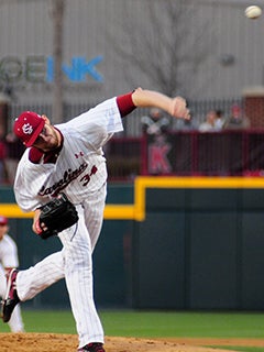 Starting pitcher Jordan Montgomery (34) of the South Carolina Gamecocks  delivers a pitch in an NCAA Division I Baseball Regional Tournament game  against the Campbell Camels on Friday, May 30, 2014, at