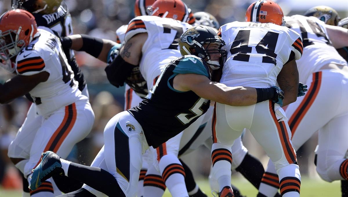 NFL star Paul Posluszny helps neighbor install hurricane shutters