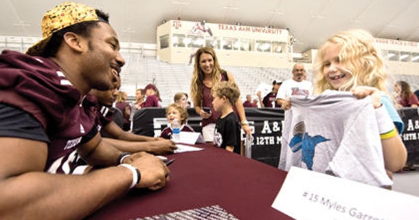 myles garrett dinosaur shirt