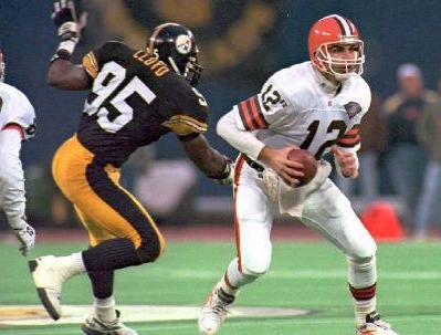 Pittsburgh Steelers Greg Lloyd sits on his helmet during the final