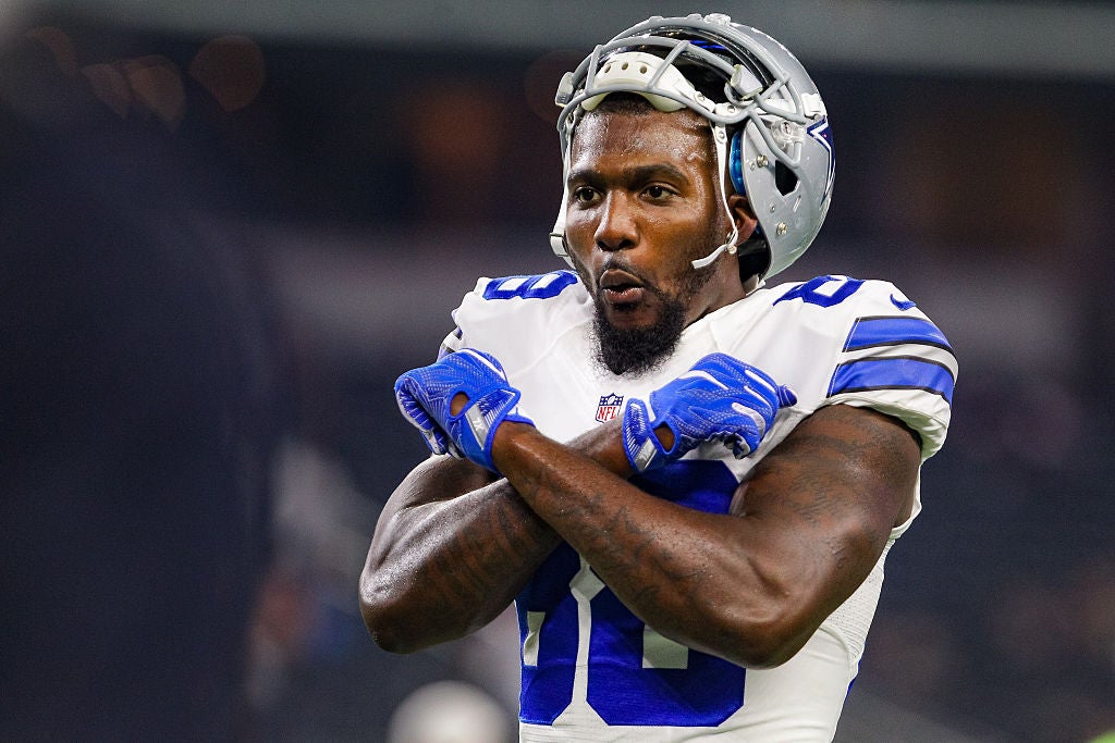 Oklahoma State players freak out when Dez Bryant reveals their new