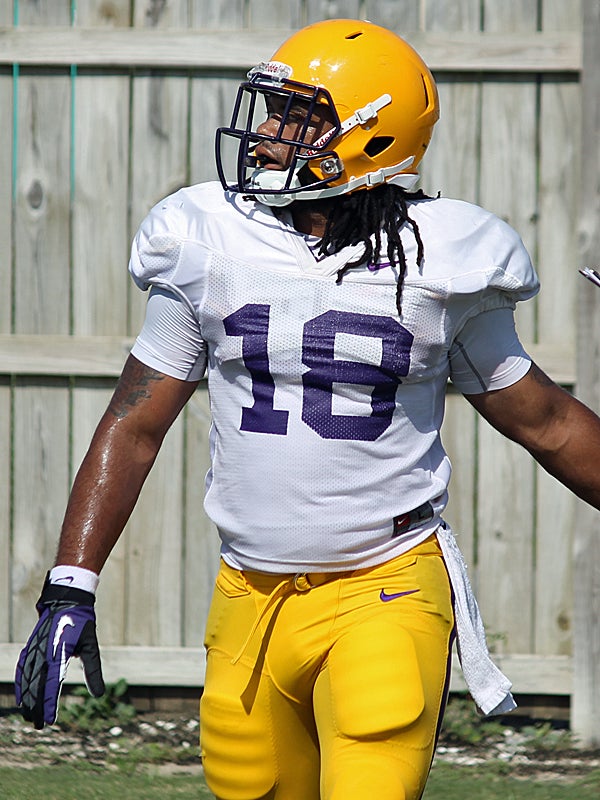 Cleveland Browns running back Terrence Magee (33) is stopped by