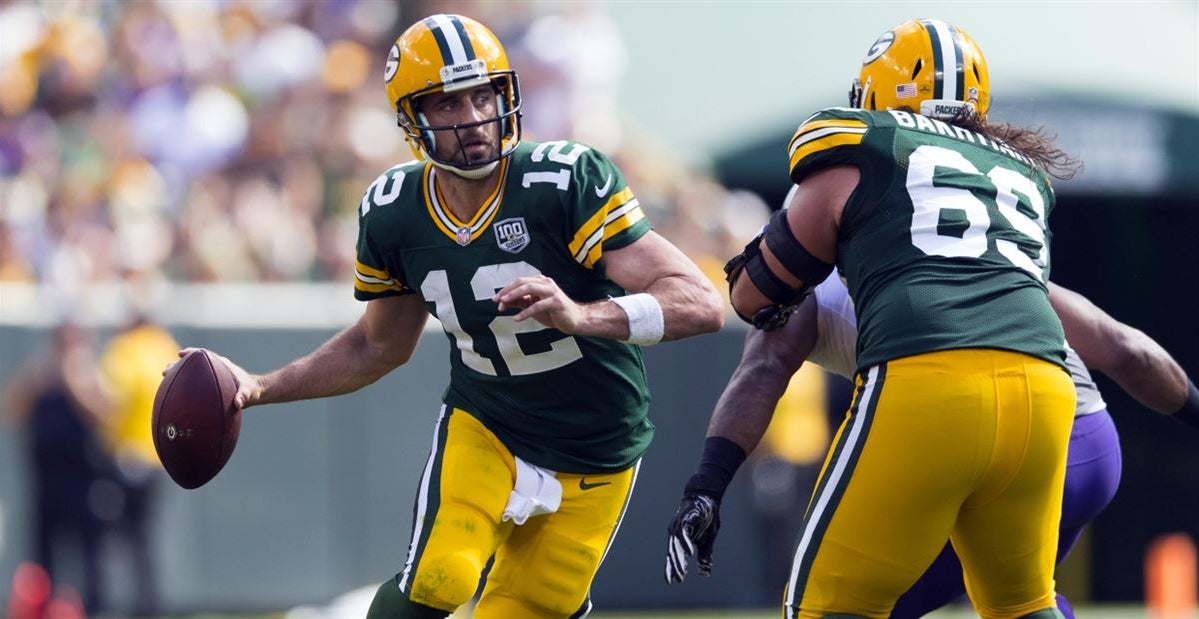 Aaron Rodgers plays through additional pain
