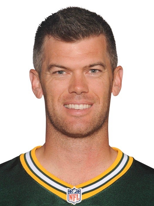 Georgetown's Mason Crosby kicks past the Cowboys