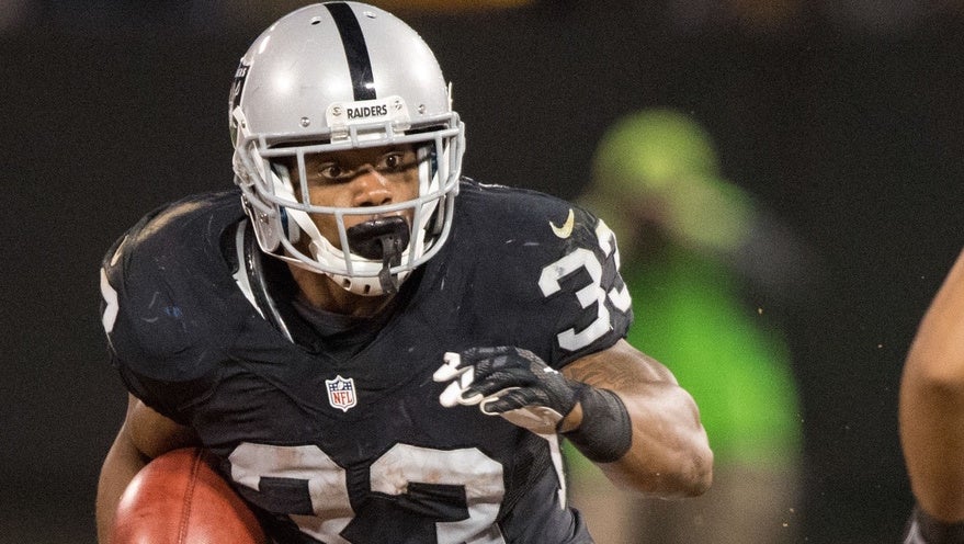 Oakland Raiders middle linebacker Marquel Lee (52) celebrates after making  a defensive stop wit …