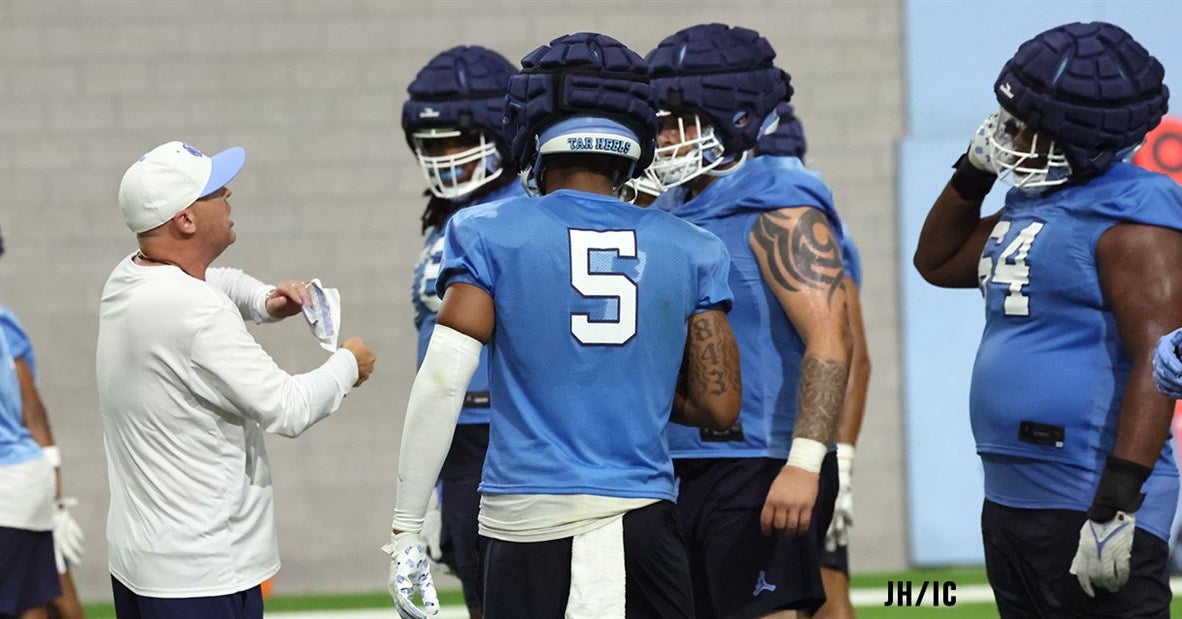 UNC Football Adjusts to New In-Helmet Communication