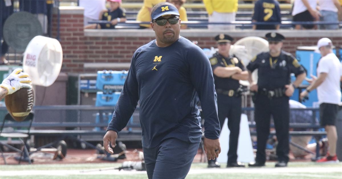 Michigan RB coach Mike Hart carted off field, taken to hospital after  suffering seizure