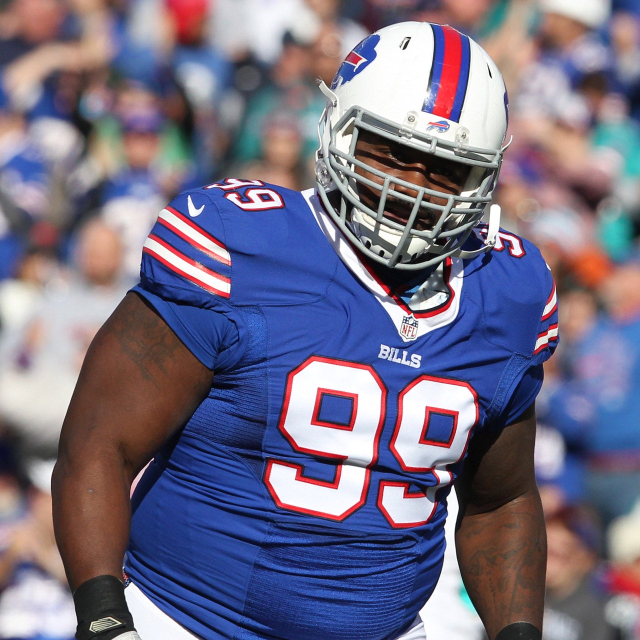 Buffalo Bills defensive tackle Marcell Dareus, center, passes