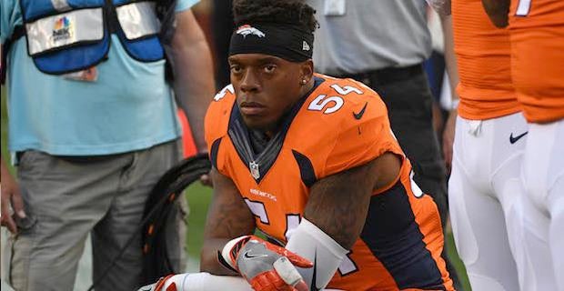 Denver Broncos inside linebacker Brandon Marshall (54) kneels