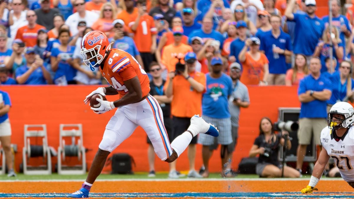 Kyle Trask breaks completion record in leading Gators over Towson