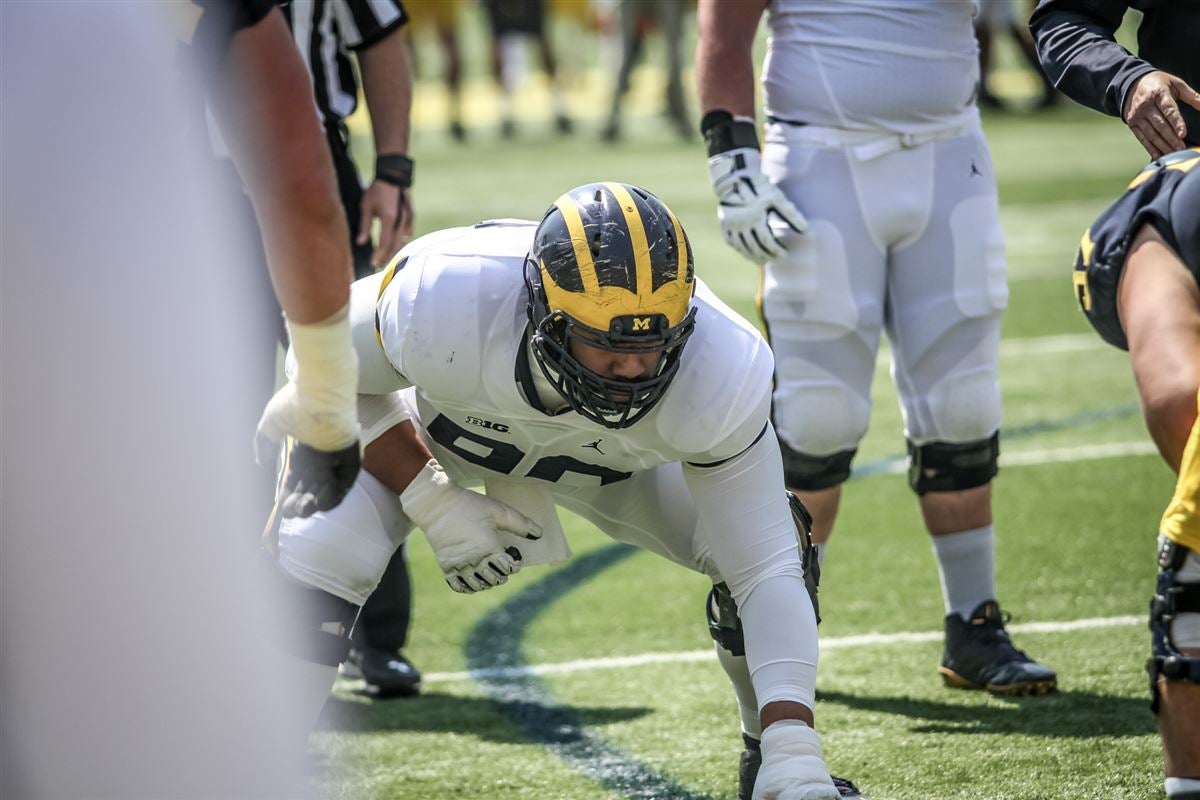 Saturday, November 29, 2014: Michigan defensive lineman Bryan Mone glances  at the scoreboard as the final minutes tick off the clock in UM's 42-28  loss to Ohio State, Saturday afternoon at Ohio