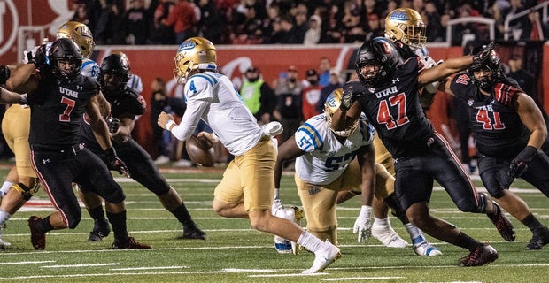 Miki Sogutoraga and Van Willinger follow quarterback at UCLA
