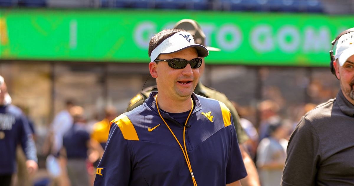 West Virginia football coach Neal Brown posts photo of Mountaineer Field  littered with sports cars