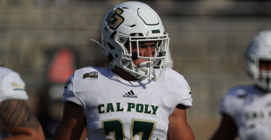 Former Cal Poly wide receiver Chris Coleman reacts to signing with