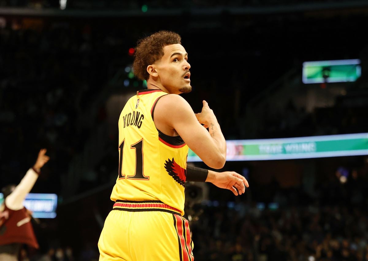 trae young yellow jersey