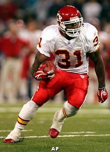 Kansas City Chiefs running back Larry Johnson evaded Cincinnati