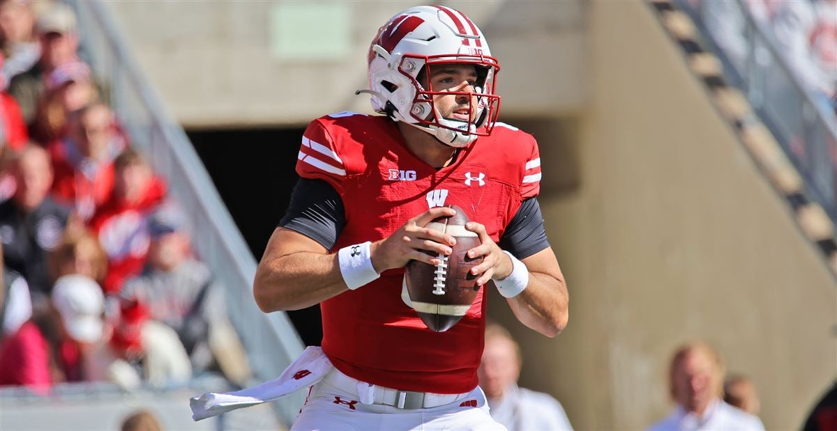 WATCH: A former Wisconsin Badger strips the opposing QB for his