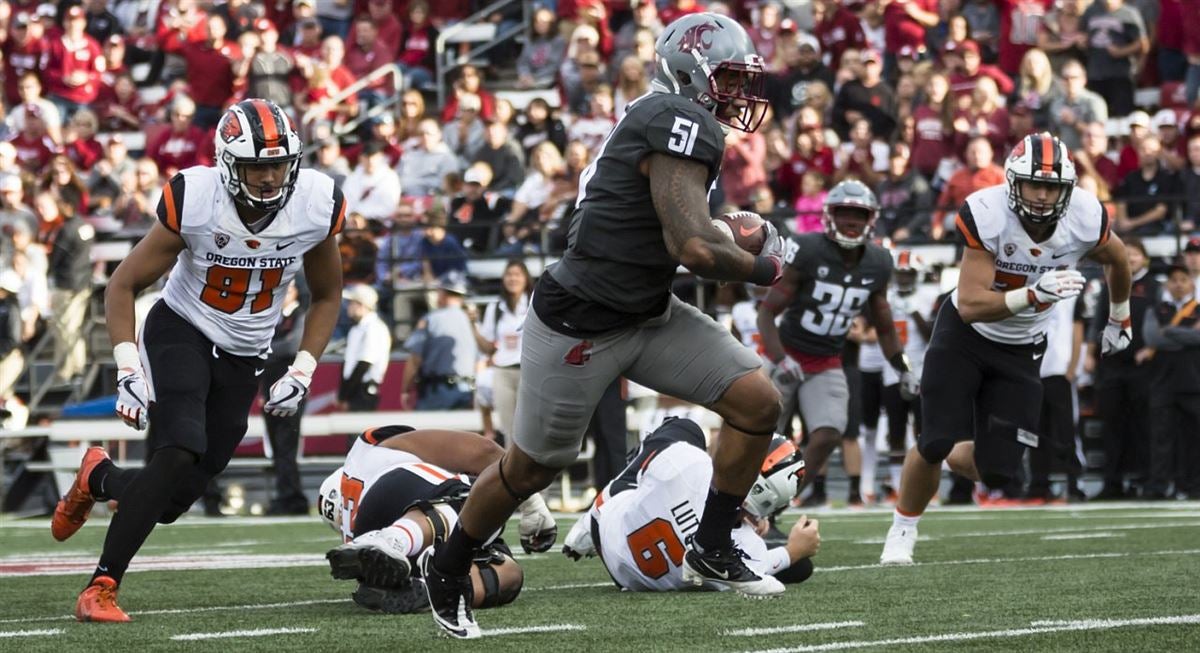 WSU senior Frankie Luvu unleashes his inner Boa