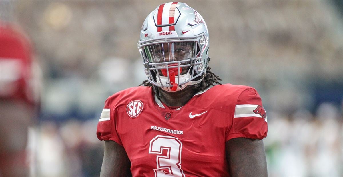 Arkansas defensive lineman McTelvin Agim gets ready to run a play against  Mississippi State during an NCAA college football game, Saturday, Nov. 2,  2019 in Fayetteville, Ark. (AP Photo/Michael Woods Stock Photo 