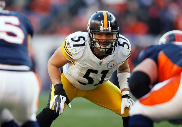 Pittsburgh Steelers linebacker James Farrior fumbles his recoverd