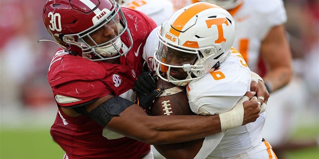 Alabama LB Jihaad Campbell with a monster hit knocking the helmet clea