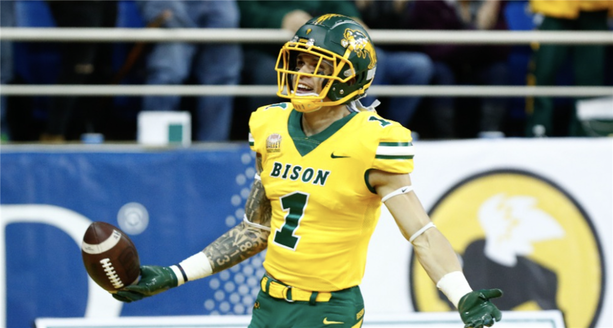 National Team wide receiver Christian Watson of North Dakota State (1) runs  through drills during practice for the Senior Bowl NCAA college football  game Thursday, Feb. 3, 2022, in Mobile, Ala. (AP