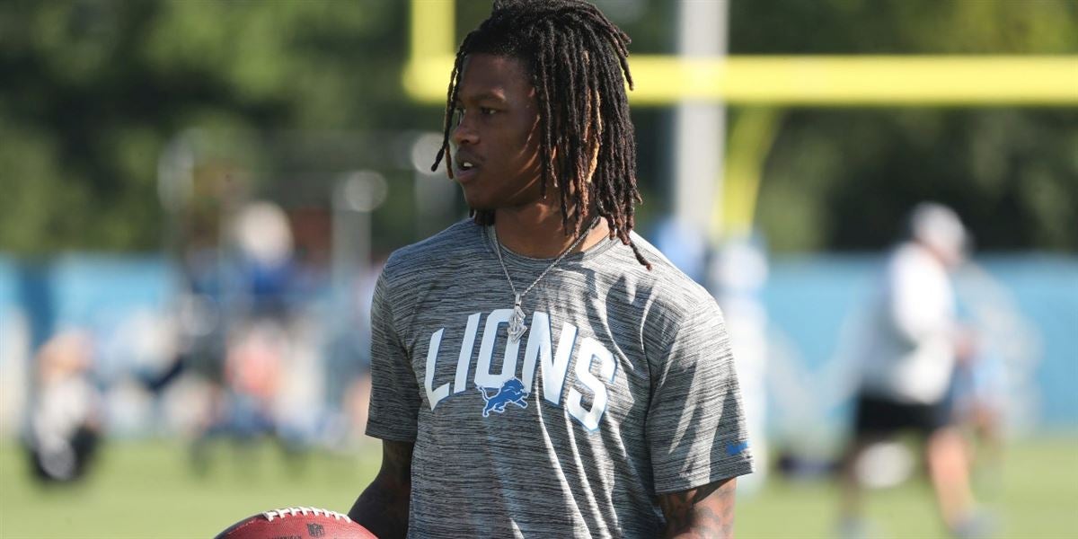 Lions receiver Jameson Williams all smiles while idled by ACL rehab