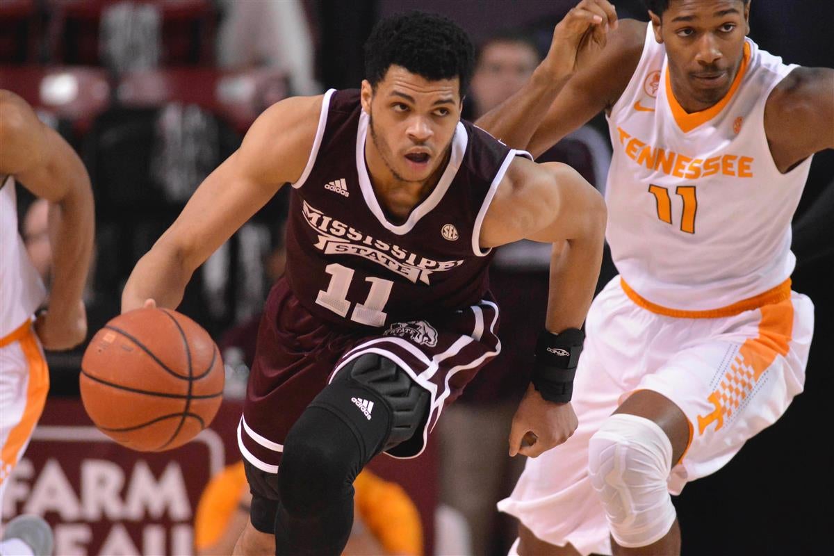 Tennessee forward Grant Williams (2) passes over Mississippi State guard  Xavian Stapleton (3) during the first