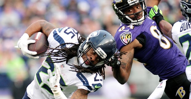 Former Seattle Seahawks WR tackles Richard Sherman by the hair