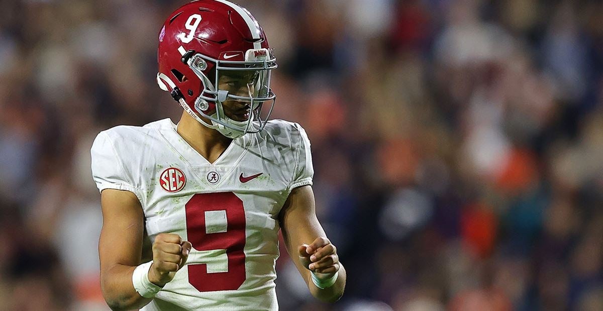 DeVonta Smith congratulates Alabama's Bryce Young for Heisman