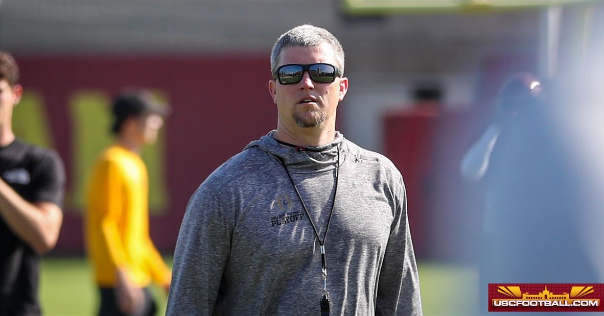 USC's Ryan Dougherty gives encouraging attention to special teams details