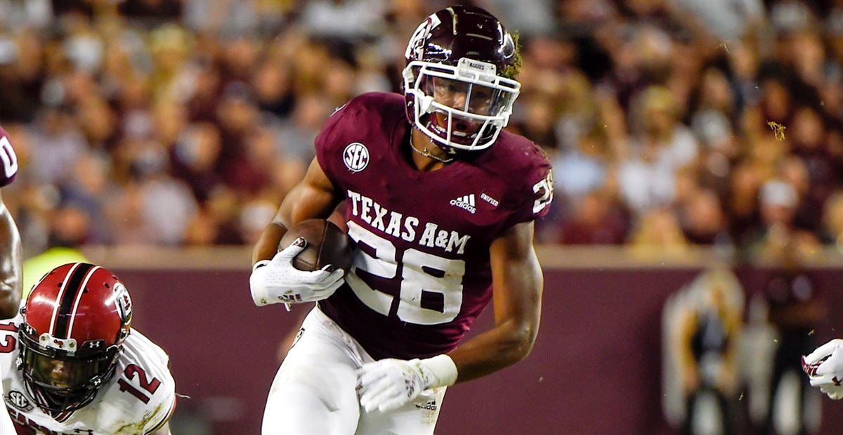 LOOK: Former Texas A&M Aggies Running Back Isaiah Spiller in Full Los  Angeles Chargers Gear - Sports Illustrated Texas A&M Aggies News, Analysis  and More