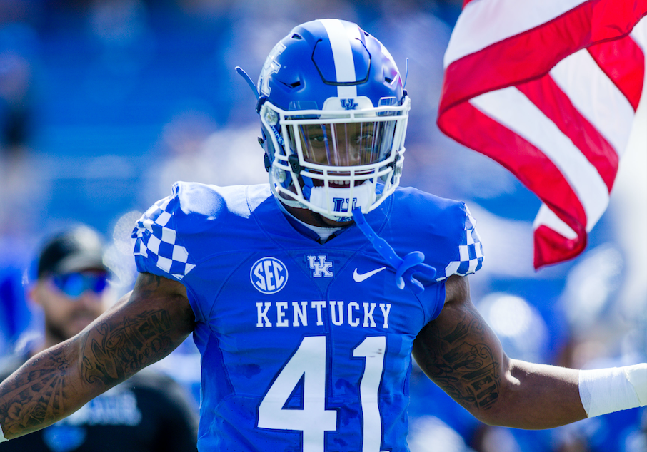 Kentucky linebacker Josh Allen holds his new team jersey after the