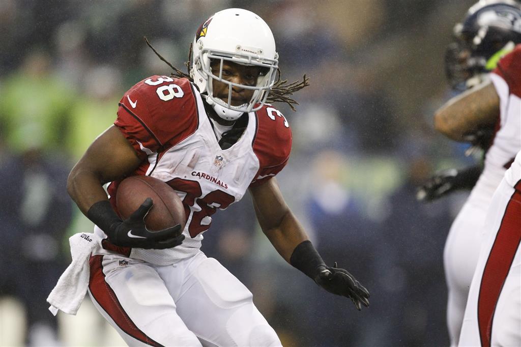 Arizona Cardinals running back Andre Ellington (38) is helped off