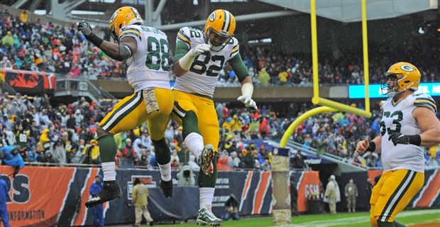 Detroit Lions running back Jamaal Williams (30) jokes with fans as he warms  up prior to an NFL football game against the Green Bay Packers, Monday,  Sept. 20, 2021, in Green Bay