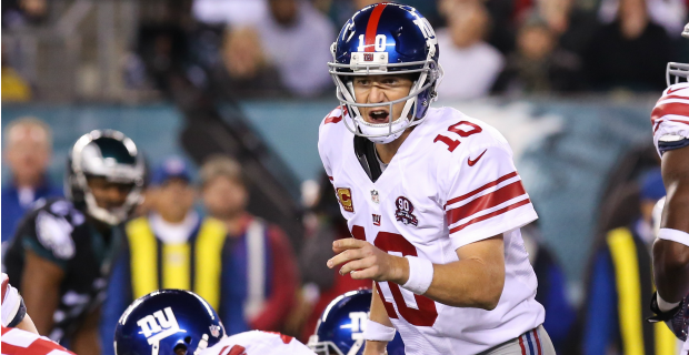 New York Giants quarterback Eli Manning looks disappointed while talking to  the coaches up stairs. The Philadelphia Eagles defeated the New York Giants  27 to 6 at Giants Stadium in East Rutherford