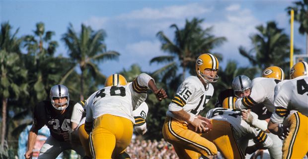 Quarterback Bart Starr of the Green Bay Packers is tackled by Dave News  Photo - Getty Images