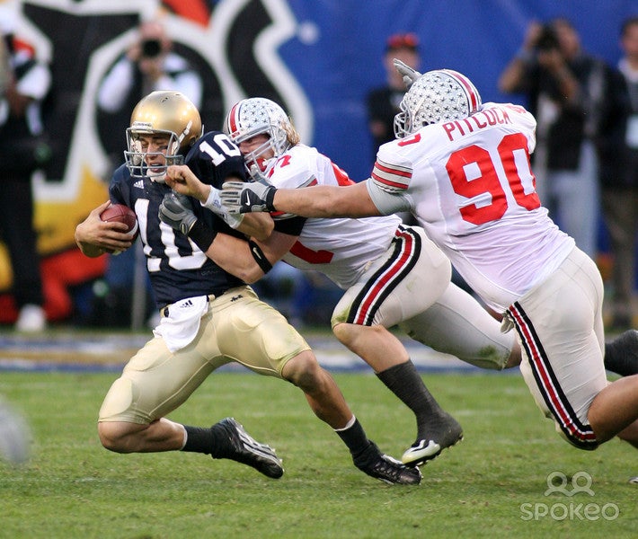 Ohio State linebacker A.J. Hawk goes in for the sack on Notre Dame  quarterback Brady Quinn (10) in the second half of the Fiesta Bowl college  football game, Monday, Jan. 2, 2006