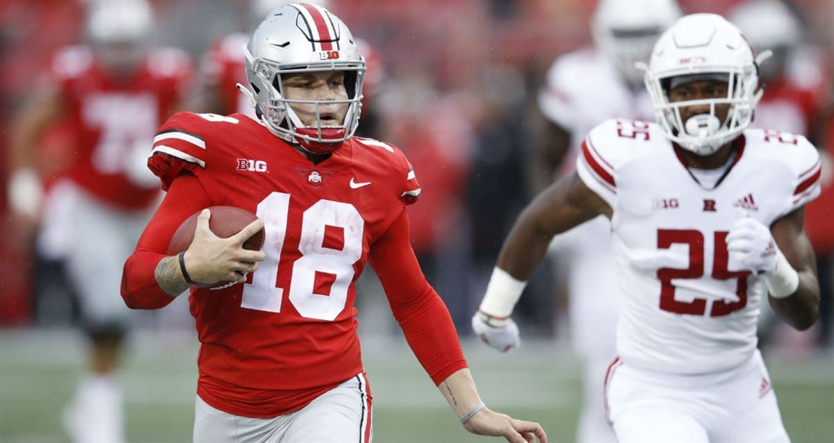 Washington Commanders quarterback Jake Fromm (11) warms up prior to the  start of an NFL pre-season football game against the Cleveland Browns,  Friday, Aug. 11, 2023, in Cleveland. (AP Photo/Kirk Irwin Stock