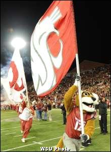 PHOTOS: Robbie Tobeck Raises 12 Flag Prior To Thursday Night