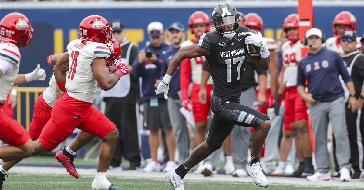 West Virginia University defeats Arizona behind ground attack