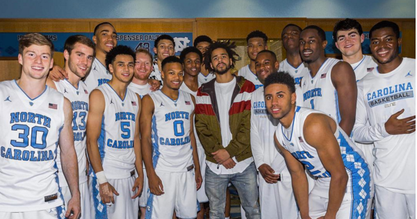 J Cole Sits Courtside At Unc Hangs With Roy And Players
