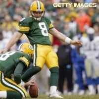 Green Bay Packers holder B.J. Sander watches as kicker Ryan