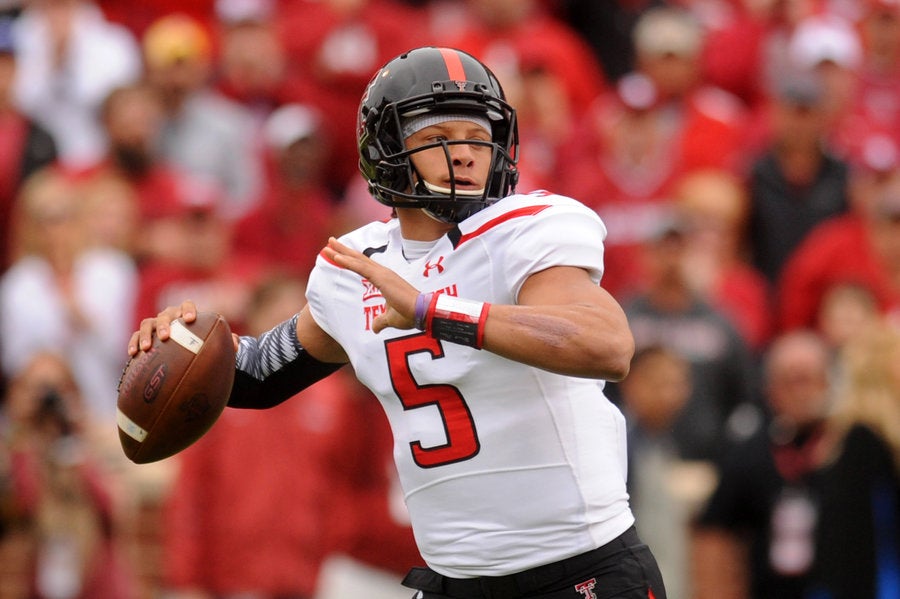 Patrick Mahomes Texas Tech Red Raiders Unsigned White Jersey Signaling A Play Photograph