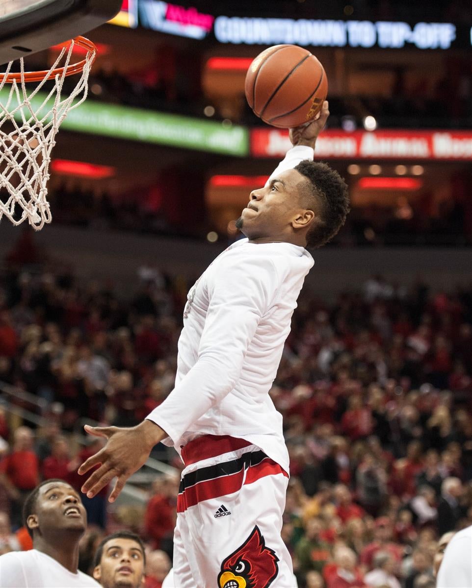 Louisville Cardinals guard Trey Lewis (3) dribbles the ball up the court  during the NCAA basketball game between Louisville and Clemson on Sunday,  January 10, 2016 at Bon Secours Arena in Greenville