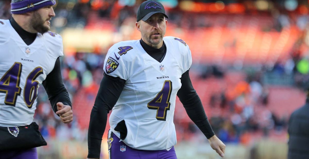 Baltimore Ravens defensive back Fish Smithson (46) and punter Sam Koch (4)  take the field during the team's Salute to Service prior to an NFL football  game against the Houston Texans, Sunday